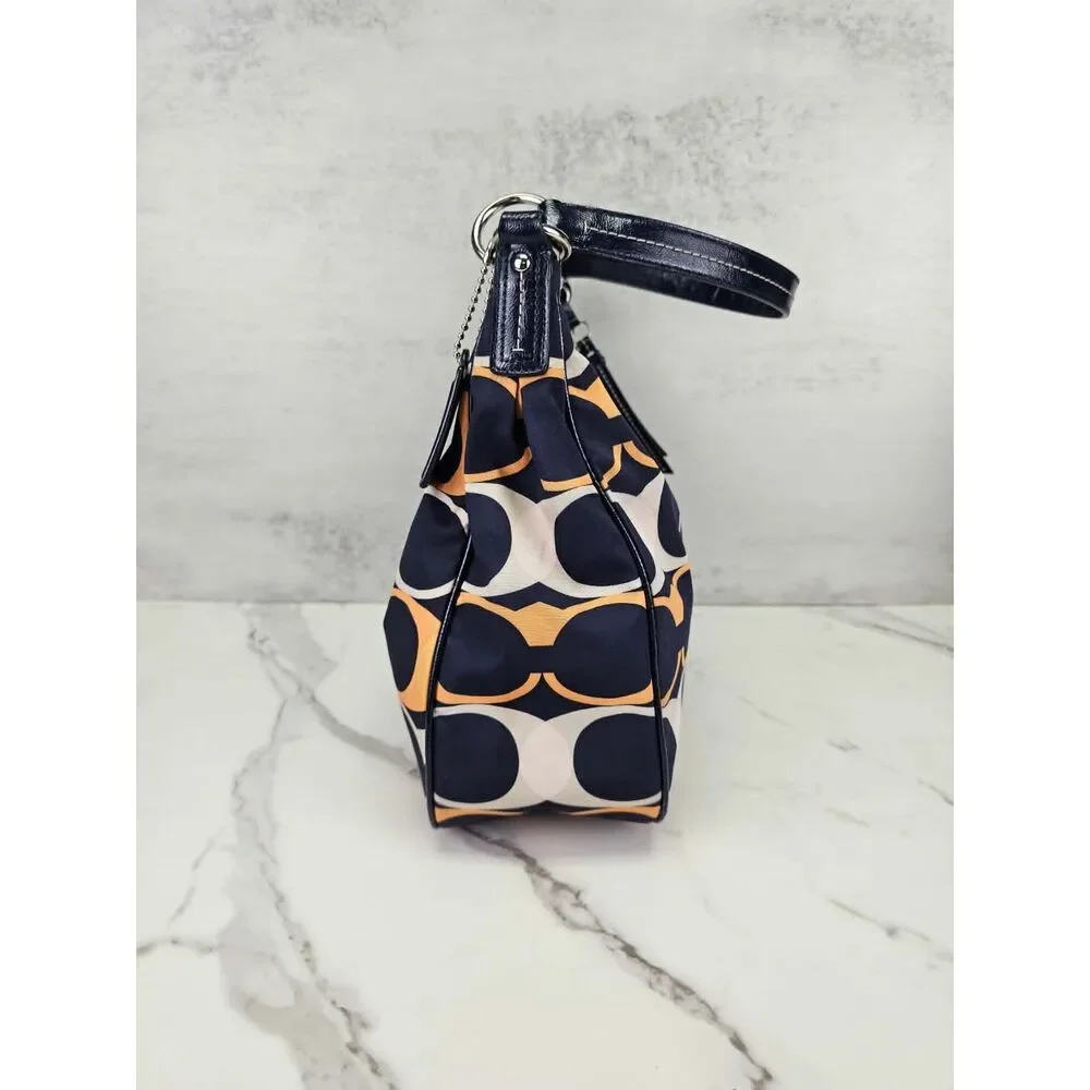 Coach Poppy Linear Signature 